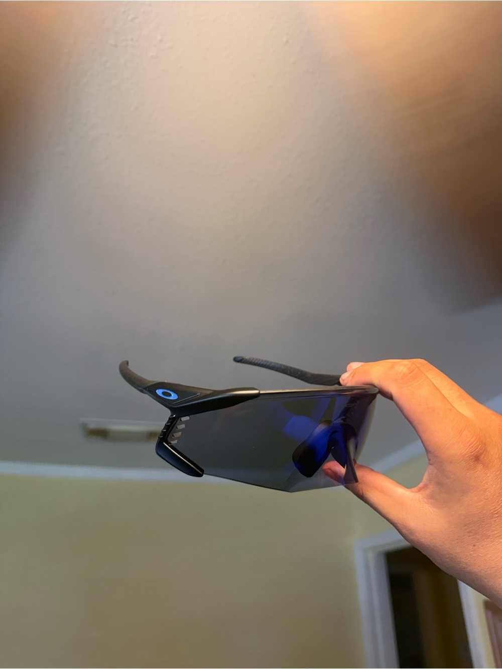 Oakley Men's Black Sunglasses with Blue Mirrored Shield Lens